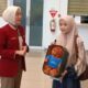Beri Kejutan di Hari Pelanggan Nasional, Bandara SMB II Bagi-Bagi Souvenir ke Pengguna Jasa
